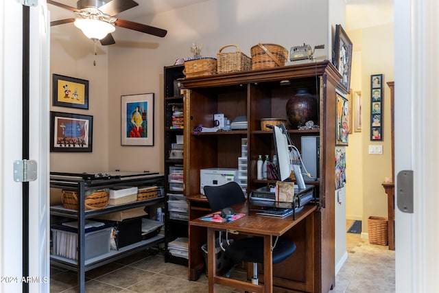 office area with ceiling fan and light tile patterned floors