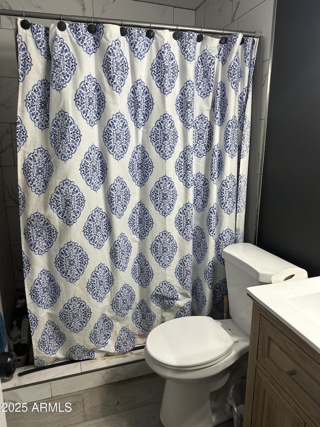 3646 N 67th Ave Unit 64, Phoenix, AZ 85033 - full bath with vanity, toilet, and a shower with shower curtain