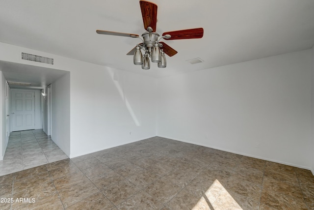 empty room featuring ceiling fan