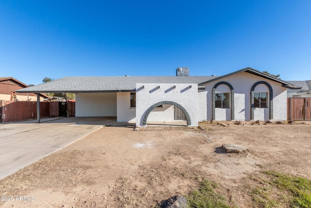 view of front of house featuring a carport