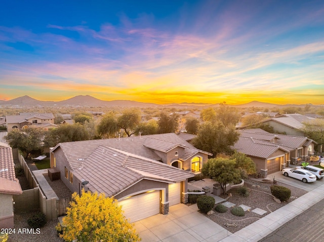 aerial view at dusk with a mountain view