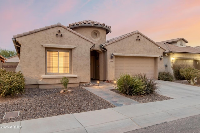 view of front of home with a garage