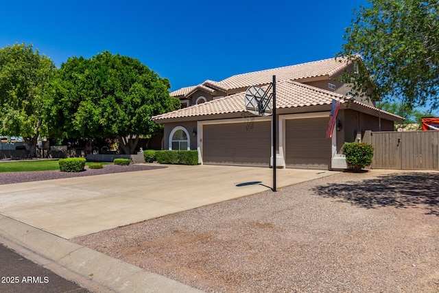 4648 W Misty Willow Ln, Glendale, AZ 85310 - view of front of property with a garage, driveway, stucco siding, a tile roof, and fence