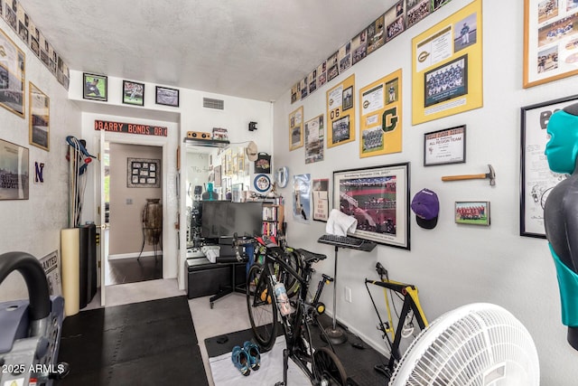 4648 W Misty Willow Ln, Glendale, AZ 85310 - exercise area featuring baseboards