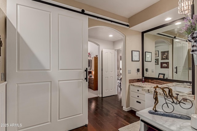 4648 W Misty Willow Ln, Glendale, AZ 85310 - bathroom with wood finished floors, recessed lighting, and baseboards