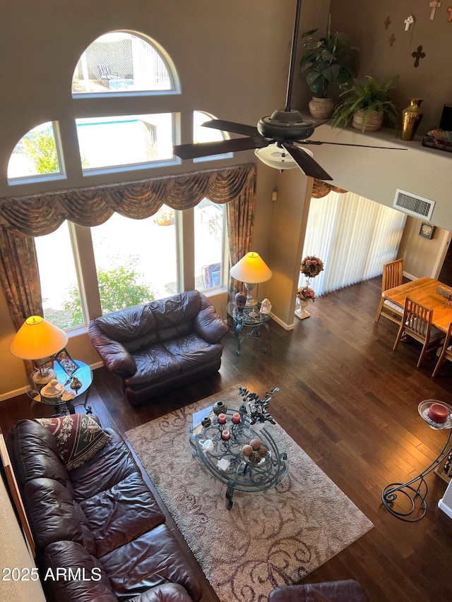 4648 W Misty Willow Ln, Glendale, AZ 85310 - living area featuring hardwood / wood-style floors, a ceiling fan, and baseboards