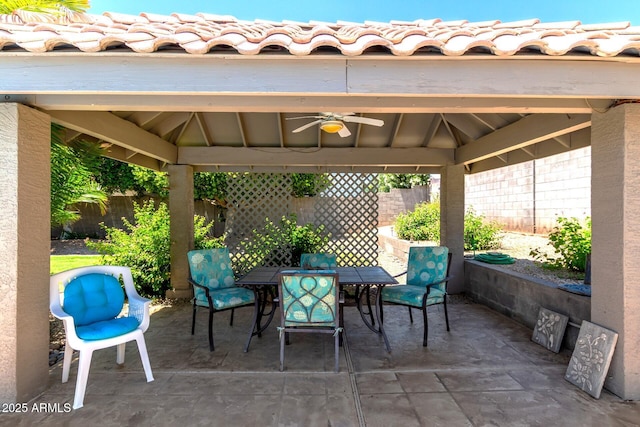 4648 W Misty Willow Ln, Glendale, AZ 85310 - view of patio / terrace featuring a gazebo, outdoor dining space, a ceiling fan, and a fenced backyard