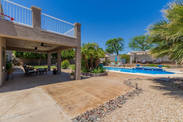 4648 W Misty Willow Ln, Glendale, AZ 85310 - view of swimming pool with a ceiling fan, a patio, and a fenced backyard