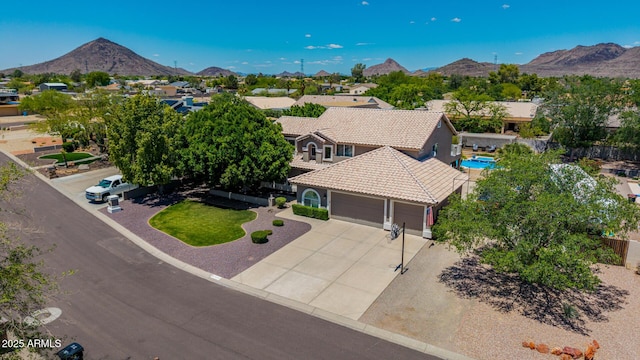 4648 W Misty Willow Ln, Glendale, AZ 85310 - aerial view of residential area featuring a mountainous background