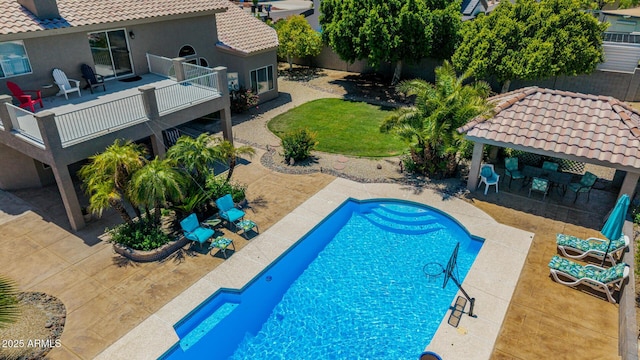 4648 W Misty Willow Ln, Glendale, AZ 85310 - view of pool featuring fence, outdoor dining area, a patio area, and a gazebo