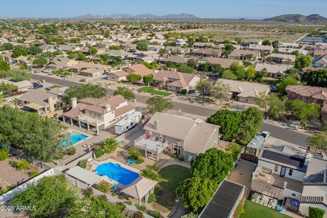 4648 W Misty Willow Ln, Glendale, AZ 85310 - aerial perspective of suburban area with a pool area and a mountain backdrop