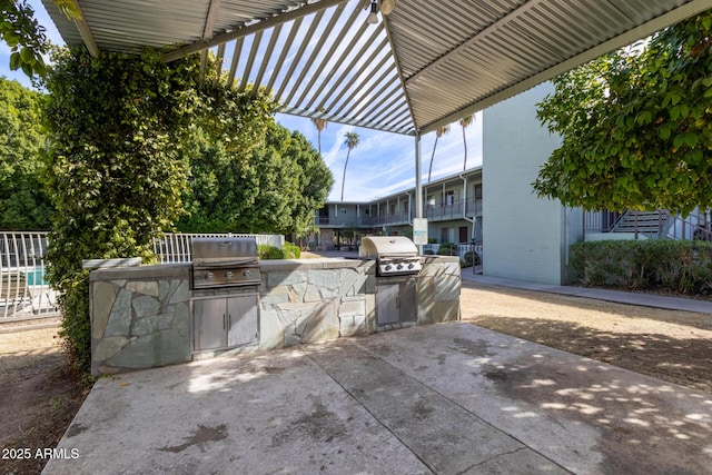 view of patio / terrace featuring area for grilling and grilling area