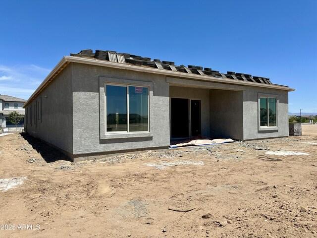22709 E Saddle Way, Queen Creek, AZ 85142 - rear view of property featuring stucco siding