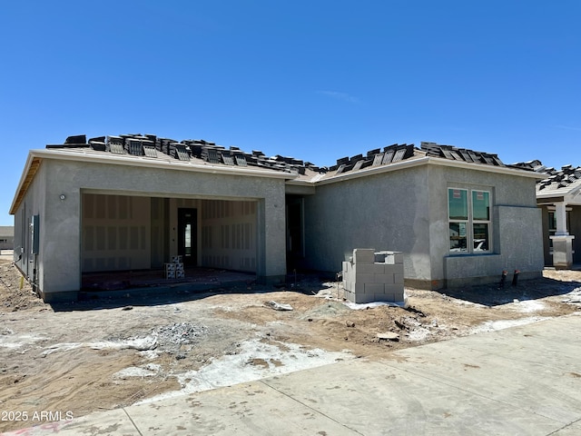 22709 E Saddle Way, Queen Creek, AZ 85142 - property in mid-construction featuring a garage and stucco siding
