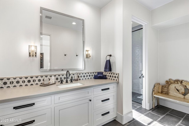 bathroom featuring backsplash, vanity, and a shower