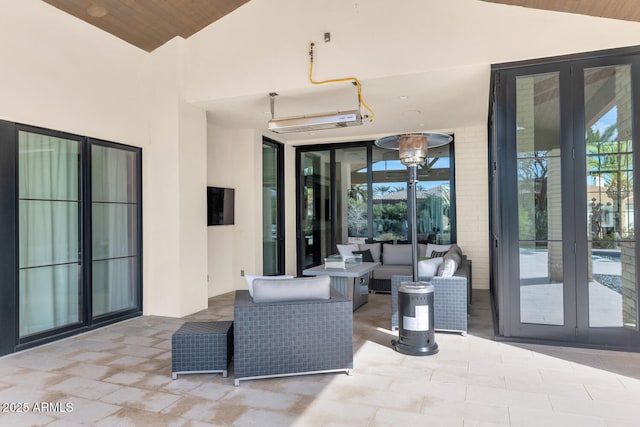 view of patio featuring an outdoor living space and french doors