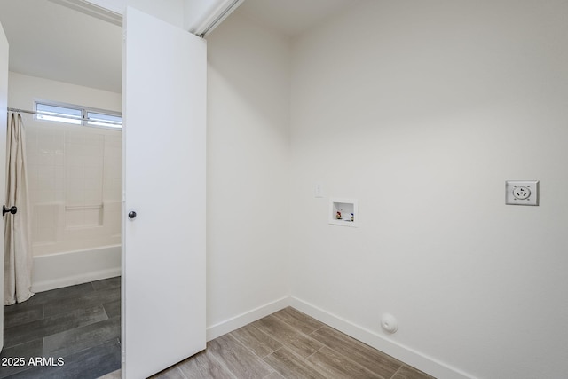 laundry room with washer hookup, hookup for a gas dryer, wood-type flooring, and hookup for an electric dryer