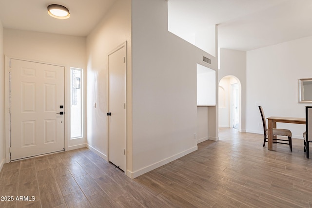 foyer with wood-type flooring