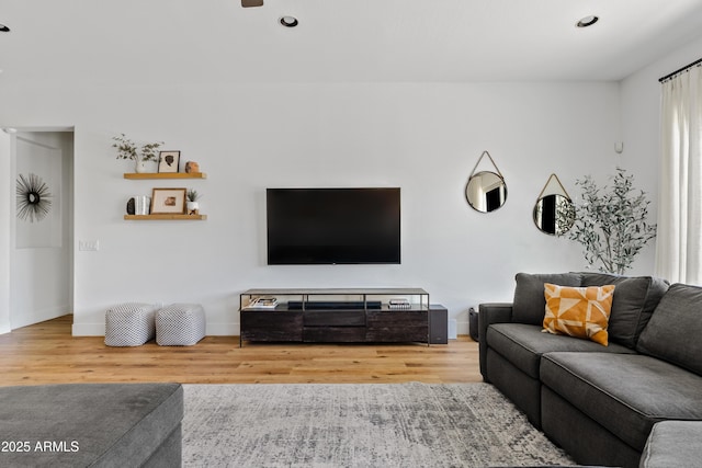 1500 E Sagittarius Pl, Chandler, AZ 85249 - living room featuring wood finished floors, baseboards, and recessed lighting