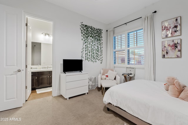 1500 E Sagittarius Pl, Chandler, AZ 85249 - bedroom featuring light carpet, ensuite bathroom, and a sink