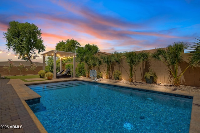 1500 E Sagittarius Pl, Chandler, AZ 85249 - pool at dusk with a fenced backyard