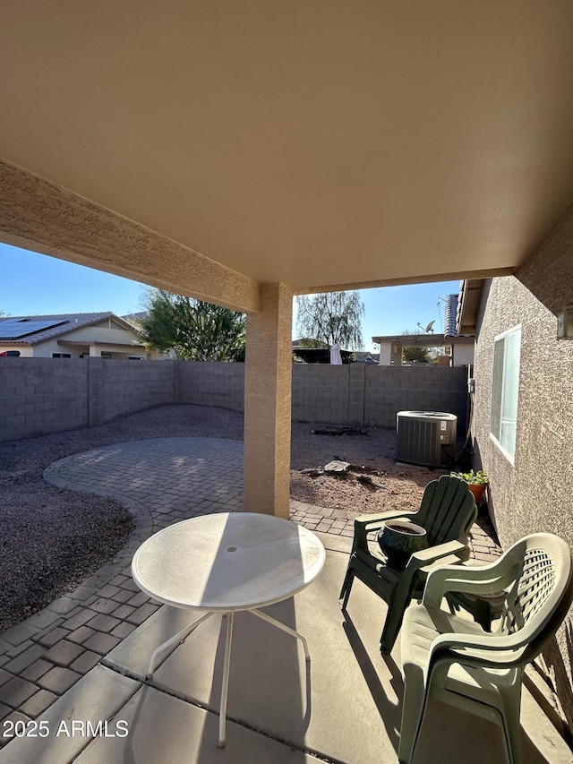 view of patio with cooling unit