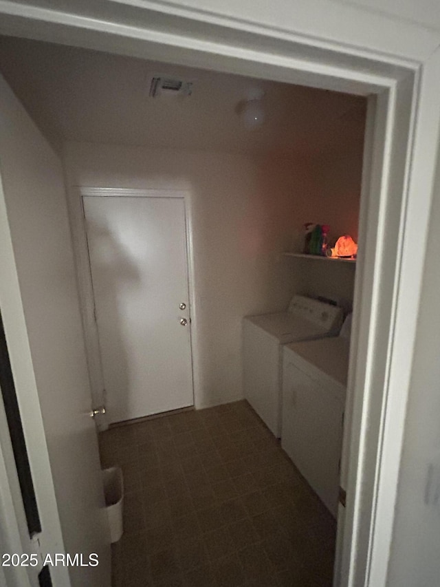 laundry room featuring washing machine and dryer