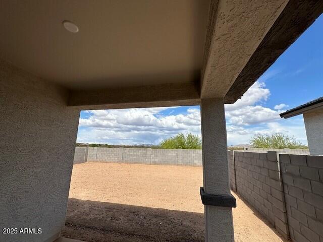 view of patio with a fenced backyard