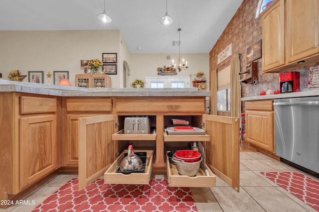 kitchen with a chandelier, stainless steel dishwasher, hanging light fixtures, and light tile patterned flooring