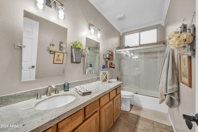 full bathroom featuring vanity, combined bath / shower with glass door, crown molding, tile patterned flooring, and toilet