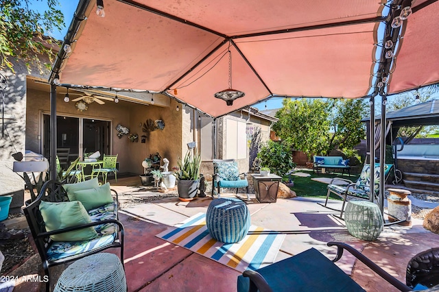 view of patio with ceiling fan