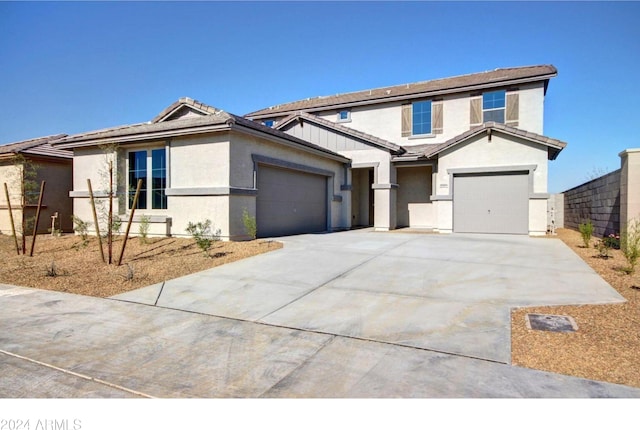 view of front of property featuring a garage