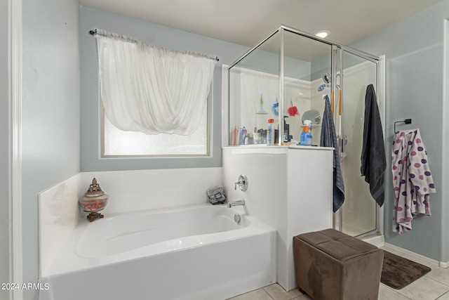 bathroom with tile patterned floors and plus walk in shower