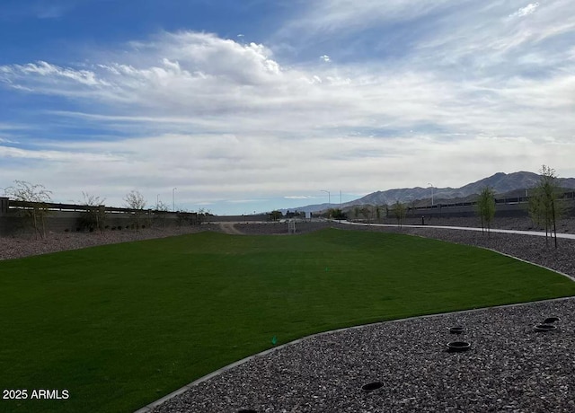 view of yard with a mountain view