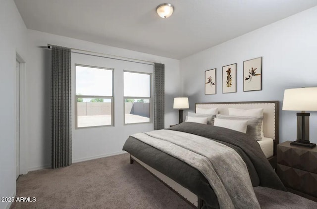 carpeted bedroom with baseboards