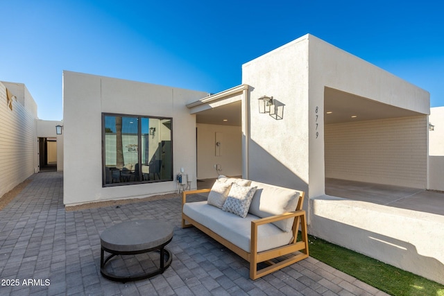 view of patio with outdoor lounge area