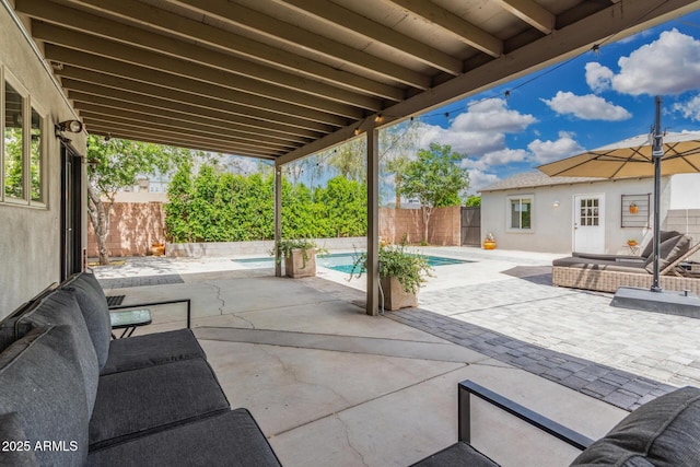 view of patio with a fenced backyard and a fenced in pool