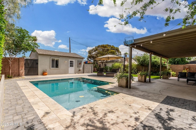 view of swimming pool featuring a fenced backyard, a fenced in pool, and a patio
