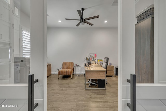 office featuring ceiling fan and light wood-type flooring