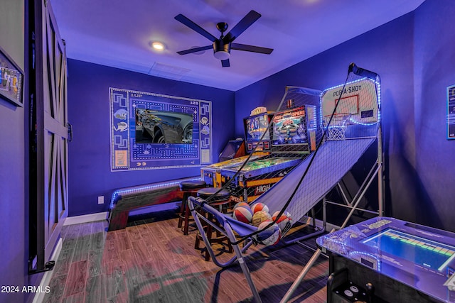 playroom featuring hardwood / wood-style floors and ceiling fan