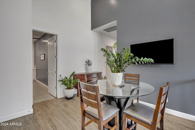 dining room with light wood-type flooring