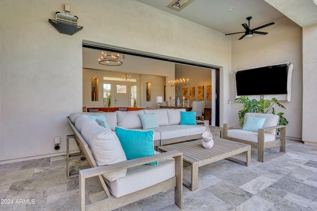 view of patio featuring an outdoor living space and ceiling fan