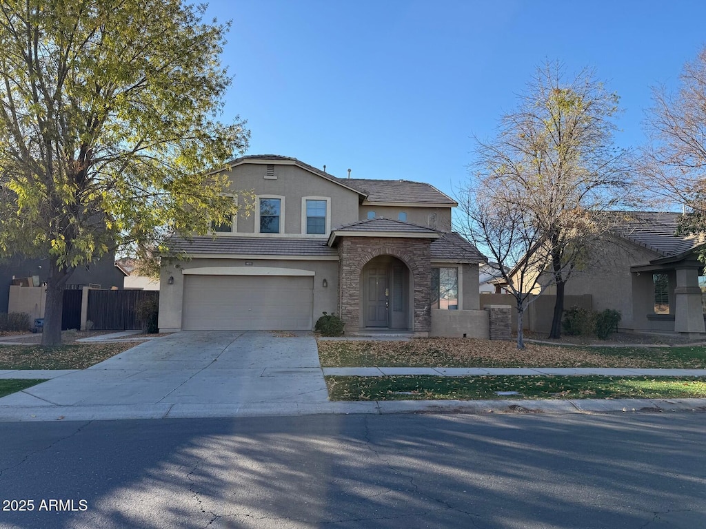 view of front of property featuring a garage