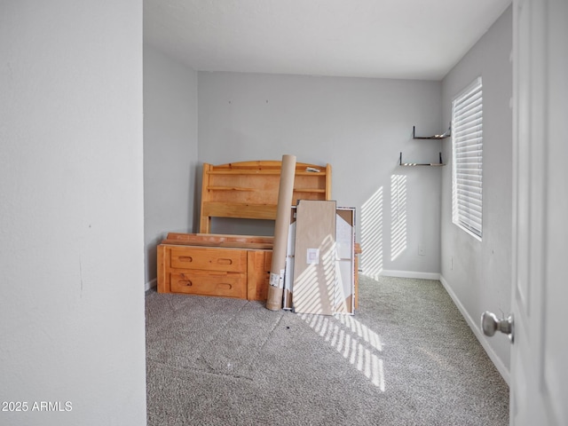 bedroom featuring light colored carpet