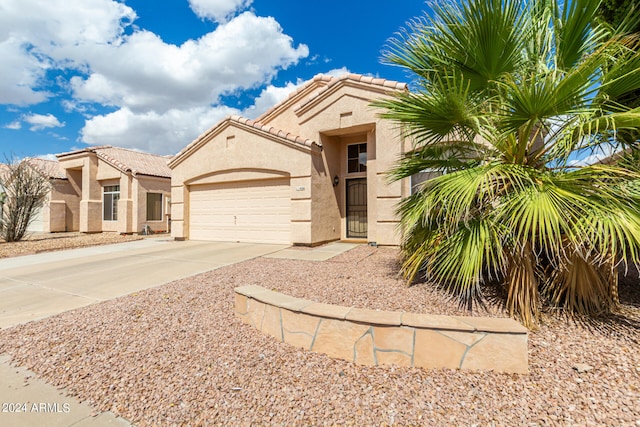 view of front of property featuring a garage