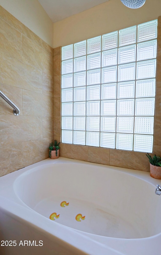 bathroom featuring a garden tub