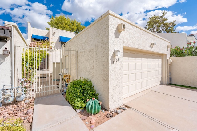 view of home's exterior with a garage