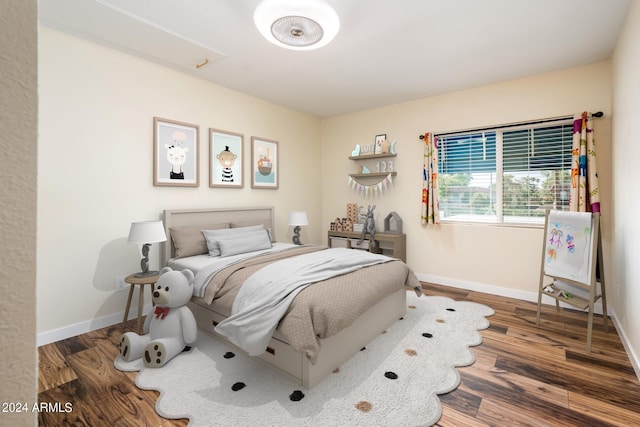 bedroom featuring wood-type flooring