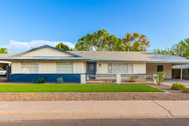 single story home with a carport