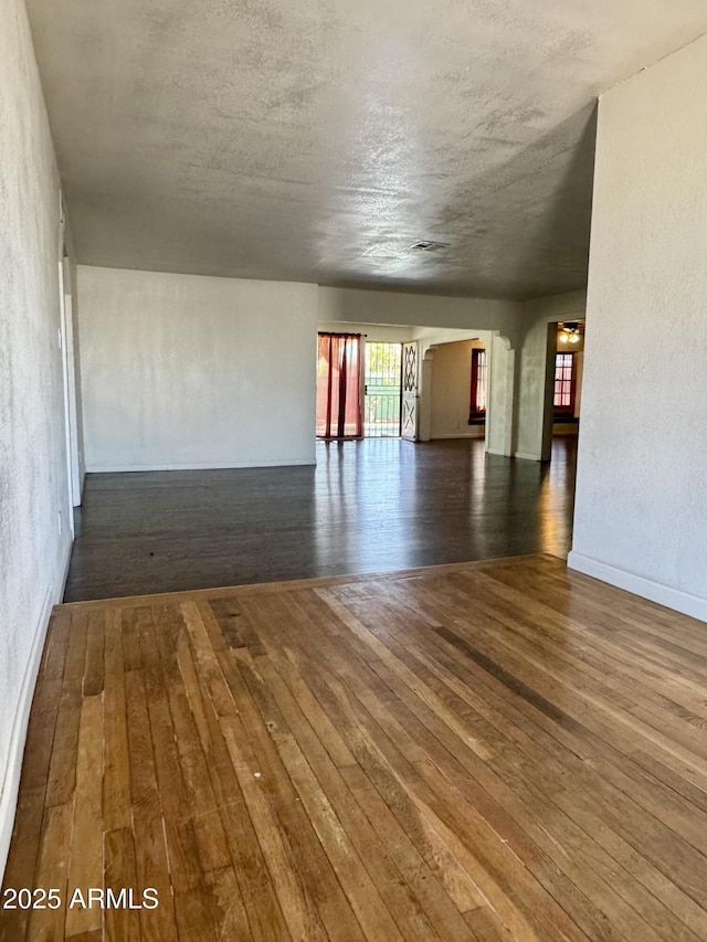 spare room featuring hardwood / wood-style floors